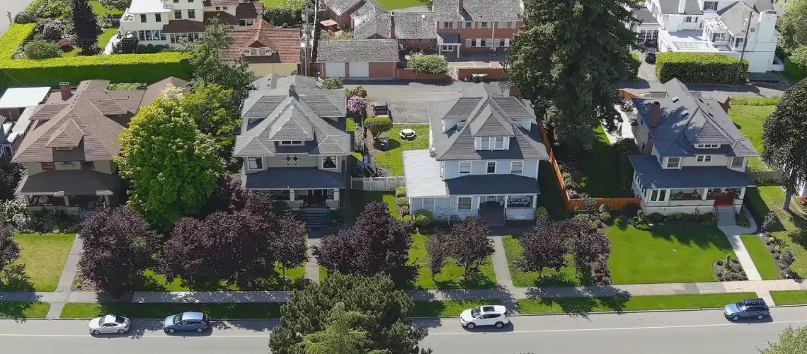 A property valuer discussing valuation errors with a homeowner